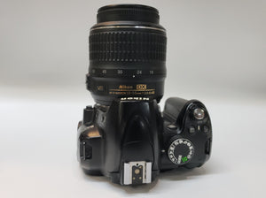 Used: Nikon D3000 With 18-55mm Lens